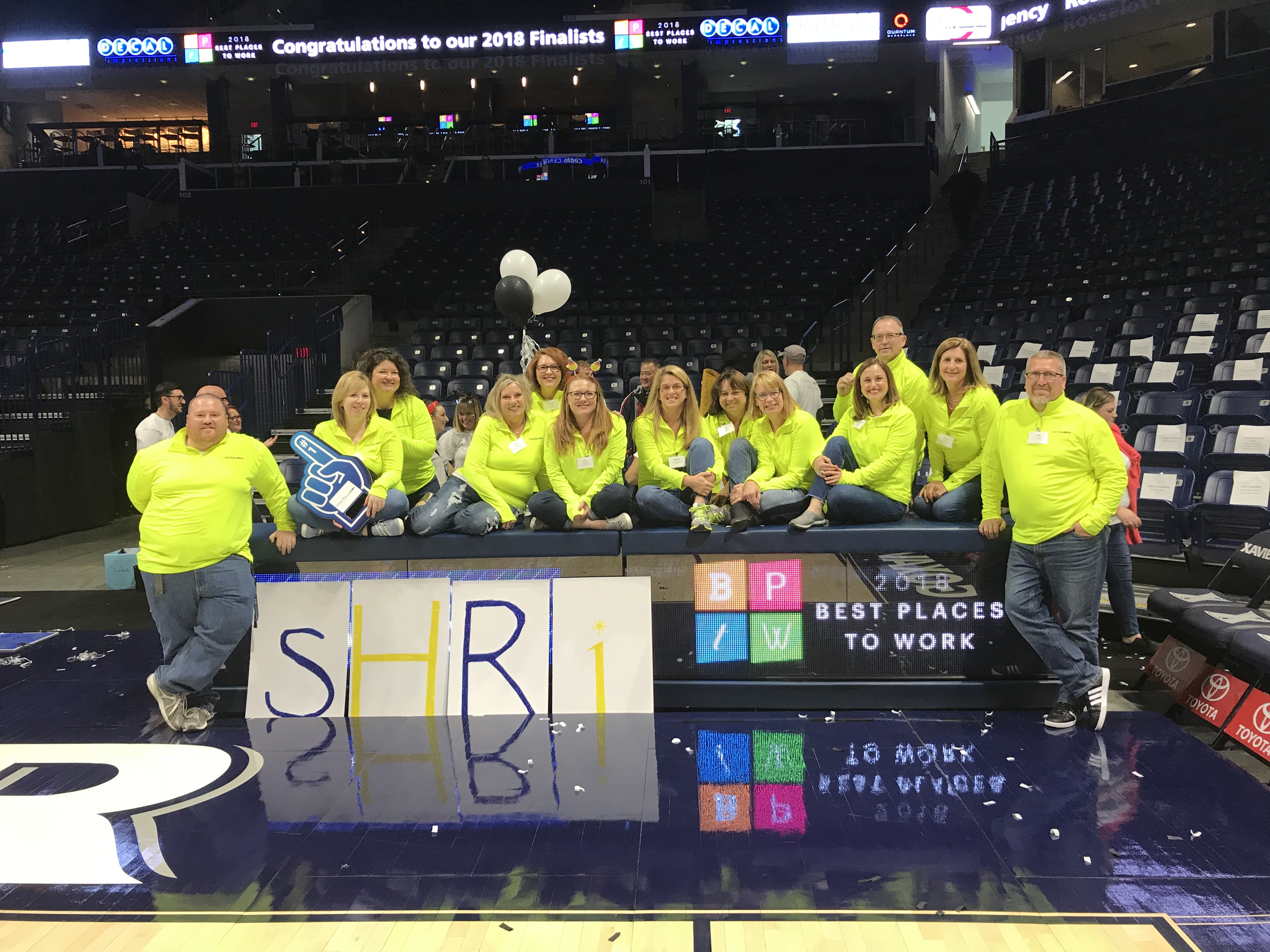 strategic HR inc team photo on the court at the Best Places to Work 2018 celebration