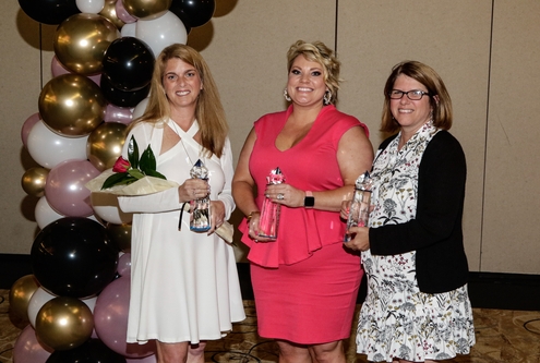 Photo of Robin Throckmorton, president of strategic HR inc., along with 2 other Women's Business Award Winners. Awards were presented by the Clermont Chamber of Commerce